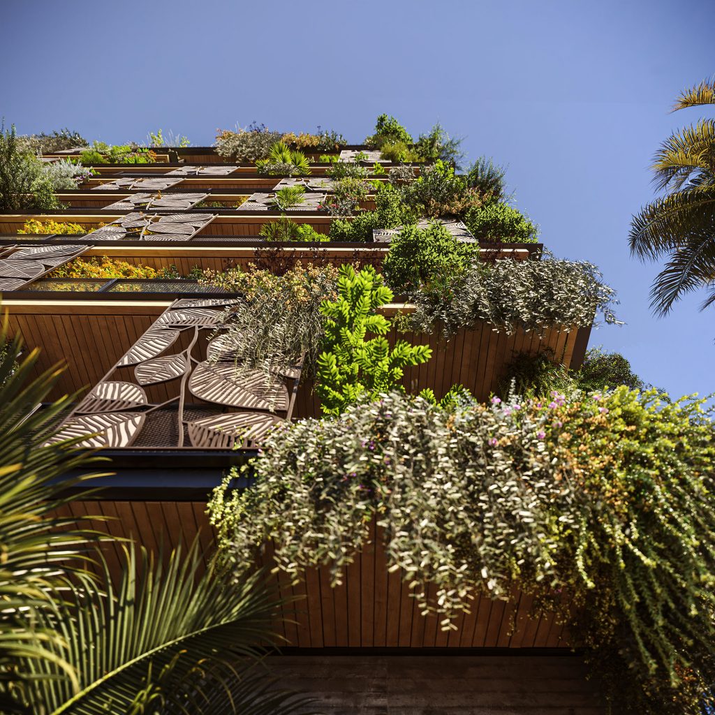 green building view from the bottom of the building with hanging plants alexandre rotier green building in ivory coast