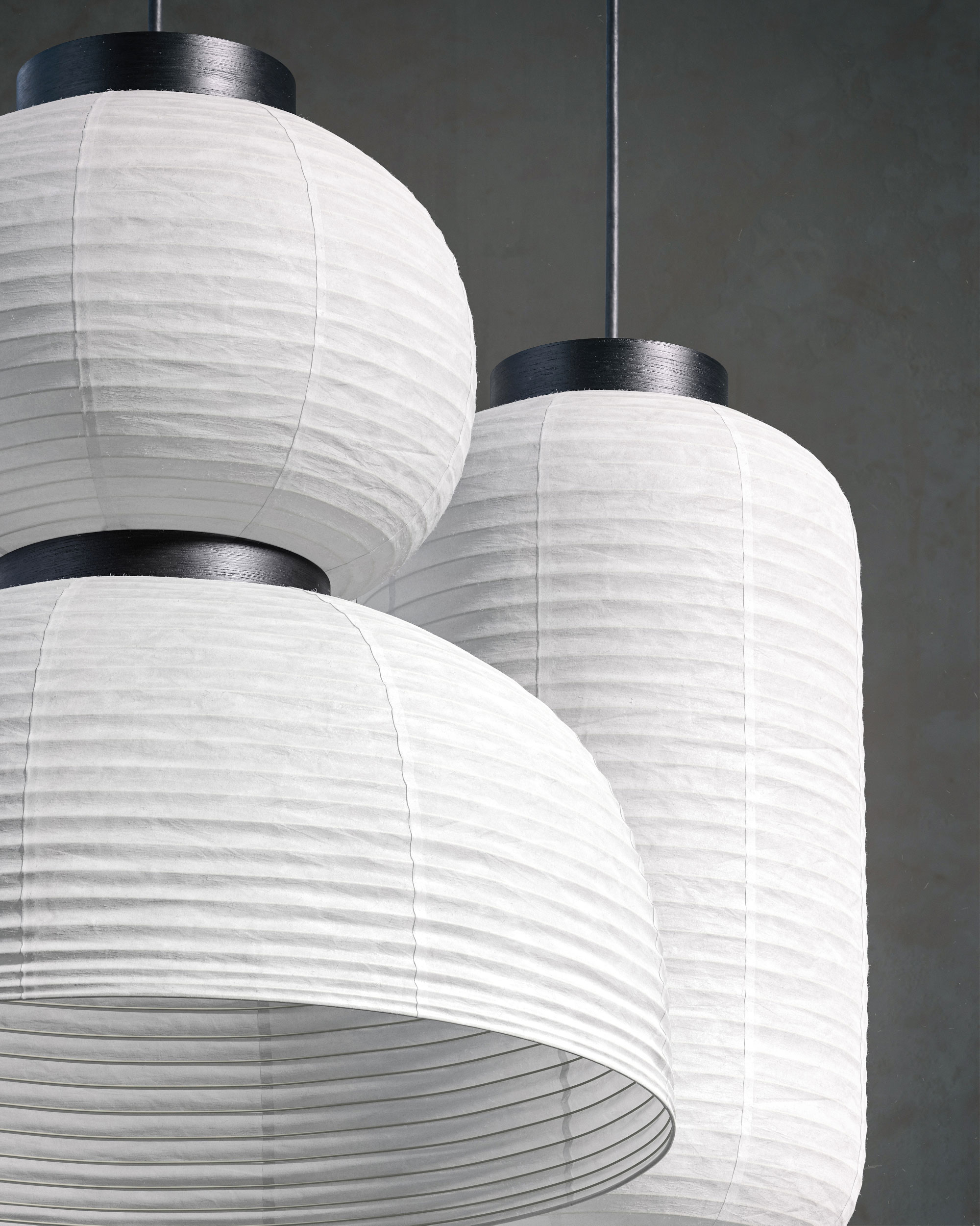two white design lamps in soft paper